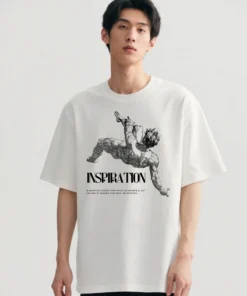 Model wearing an oversized white T-shirt featuring an inspirational artist quote design.