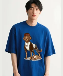 Oversized unisex t-shirt featuring a cartoon Labrador dog playing baseball printed on the front.