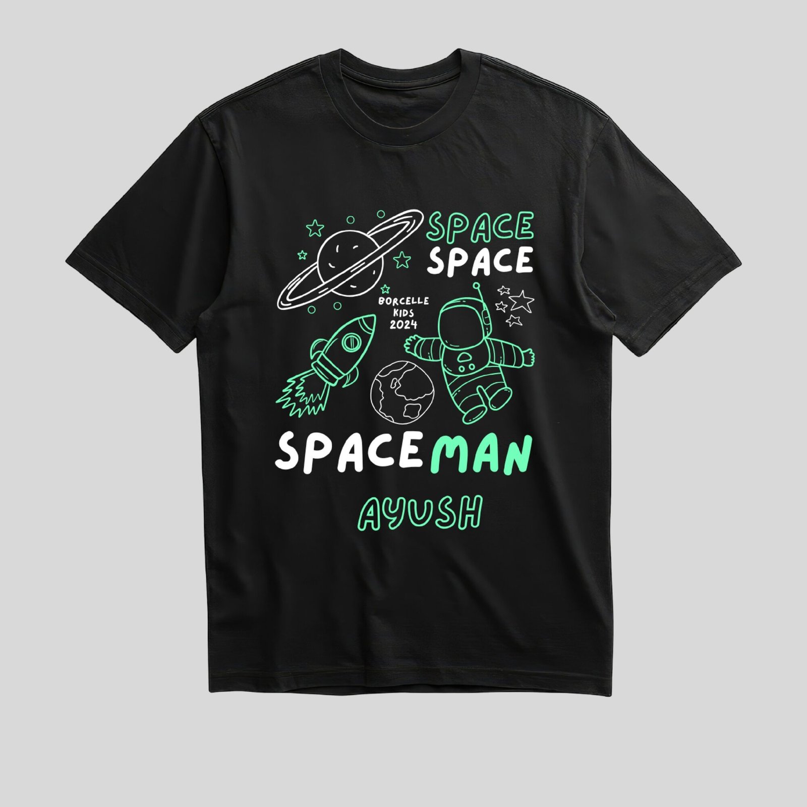 Personalized kids space adventure name T-shirt shown in white and black colors with a custom name design in a flat lay product photo.