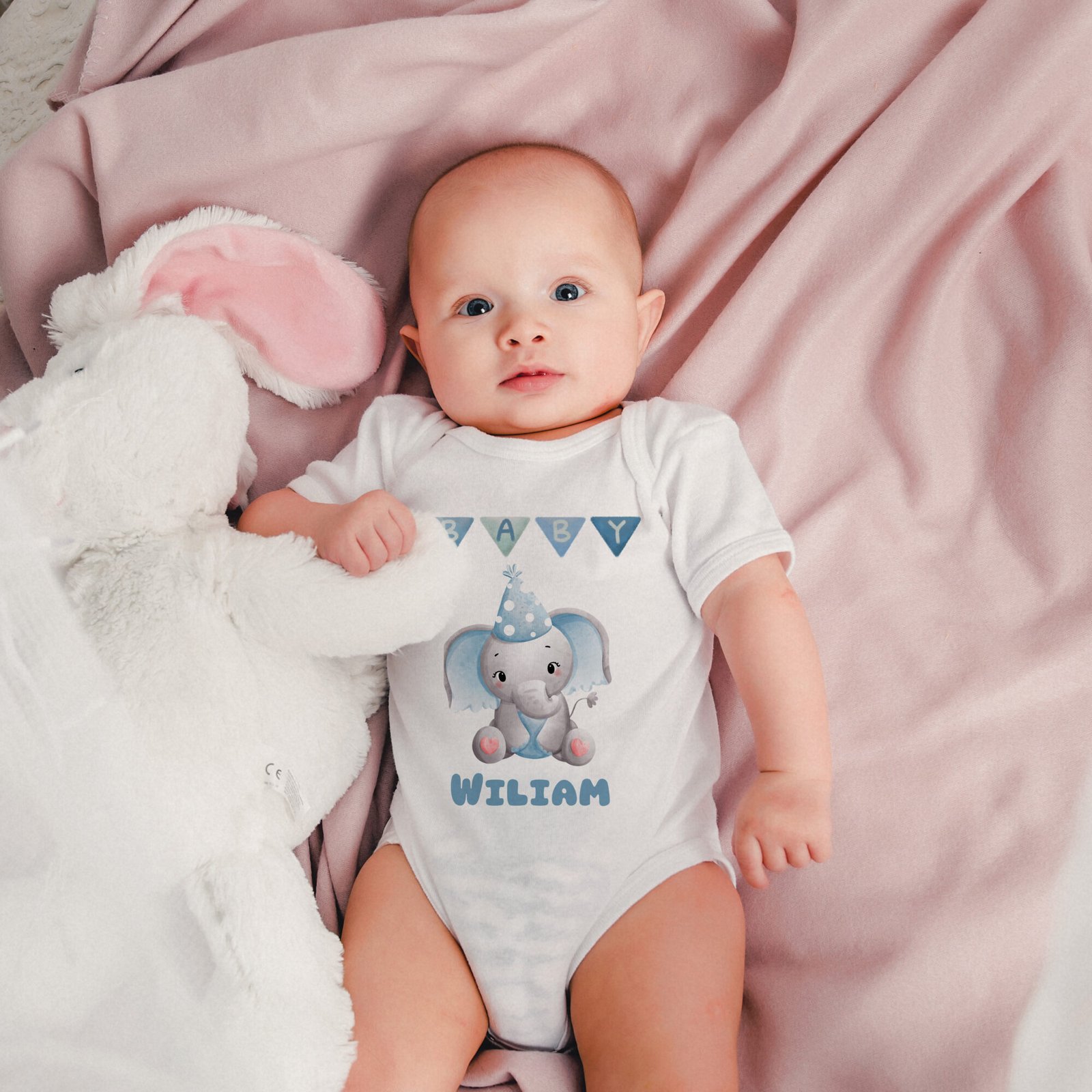 Personalized newborn baby romper featuring a cute elephant illustration and custom name, perfect as a baby shower gift or newborn outfit.