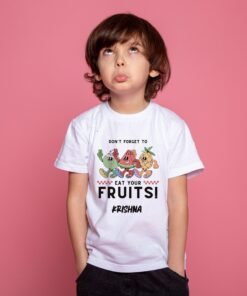 Child wearing a white personalized kids T-shirt with a custom name and "Don't Forget to Eat Your Fruits" colorful fruit design.